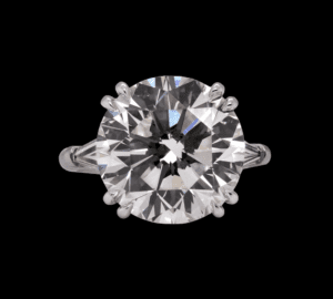 9.92CT ROUND BRILLIANT, K, SI1 set in Platinum ring  with 2 Baguette side diamonds = 0.67cttw